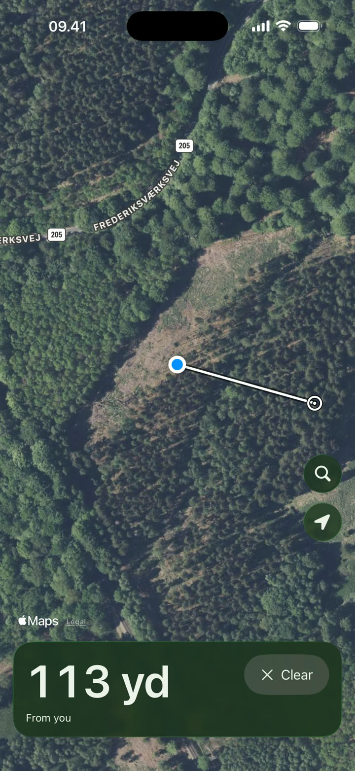 Hunting Distance showing 113 yd from the blue dot to a point on the aerial photo, with a line between them.